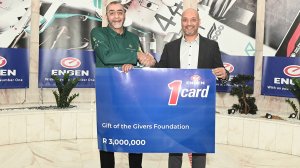 Image of Gift of the Givers founder and chairman, Dr Imtiaz Sooliman recieves a cheque for R3 million from Engen Managing Director and CEO, Seelan Naidoo