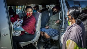 Image of commuters in a taxi