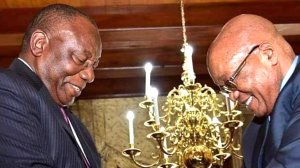 Image of President Cyril Ramaphosa shaking hands with former president Jacob Zuma