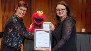 Image of Centre for Deaf Studies Professor Claudine Storbeck, ELMO and Director of Education and Outreach at Sesame Workshop South Africa Mari Payne at the Sesame Awards