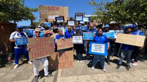 Members of the DA gathered outside the NC Health Department protesting against corruption 