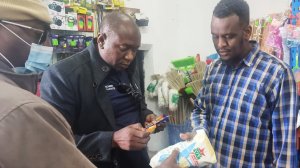Image of Inspectors who uncovered dented food which could be poisonous