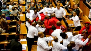 EFF members being removed by Parliament security personnel during SoNA