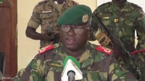 Members of the Guinea-Bissau army addressing the nation