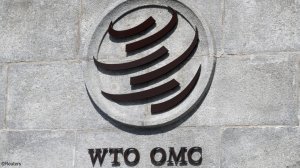 The WTO logo on a wall