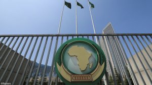 The AU logo and flags